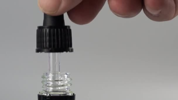 Goteando Aceite Cosmético Una Pipeta Una Botella Concepto Hidratación Cuidado — Vídeos de Stock