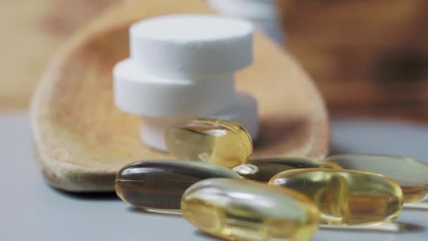 Tablets Capsules Wooden Spoon Multivitamins Supplements Natural Product Concept — Videoclip de stoc
