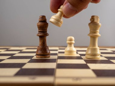 Board game of chess, old wooden chess, copy space for text. Close up.