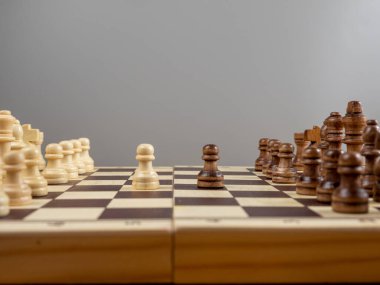 Board game of chess, old wooden chess, copy space for text. Close up.