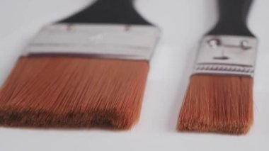 Brush for painting on a white background. High quality 4k footage