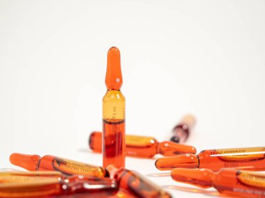 Ampoules for vitamin B12 injections. Injectable solution ampoules used to supplement vitamin B12. Close-up.