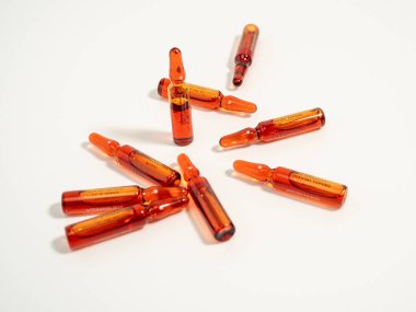 Ampoules for vitamin B12 injections. Injectable solution ampoules used to supplement vitamin B12. Close-up.