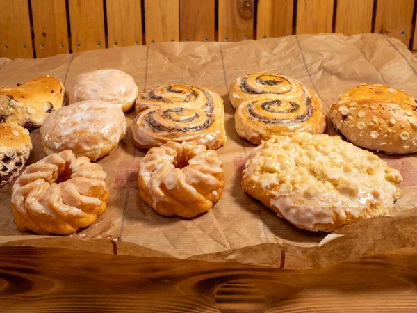 Sweet baked goods. Sweet flour products from the bakery. Freshly baked sweet buns.