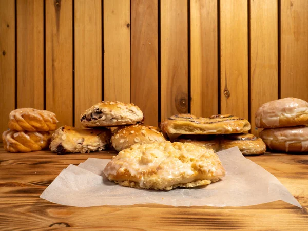 Sweet baked goods. Sweet flour products from the bakery. Freshly baked sweet buns.