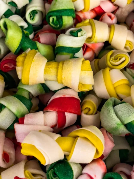 Multicolored treats for dogs. Treats for dogs. Close-up.