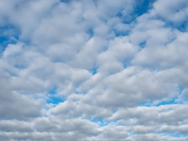 Beautiful big clouds on the blue sky. Cloud background.