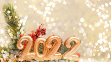 2022 noel rakamları beyaz ahşap arka planda Bokeh, noel konsepti