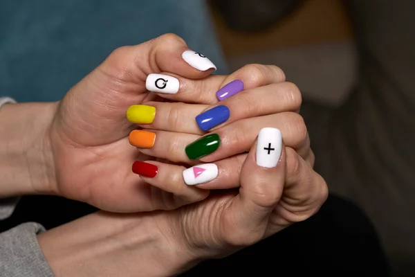 Hands with LGBT rainbow manicure — Stock Photo, Image