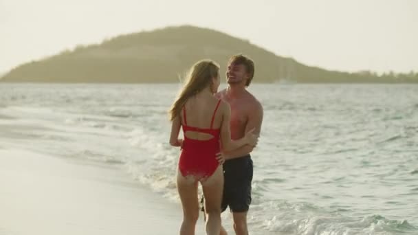 Playful Couple Splashing Each Other Ocean Beach Petit Tabac Tobago — Wideo stockowe