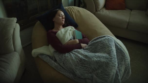 Woman Sleeping Armchair Wrapped Blanket Holding Book Murray Utah United — Stock Video