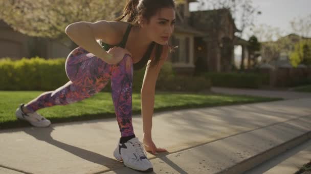 Medium Slow Motion Shot Woman Stretching Legs Sidewalk Cedar Hills — Video Stock