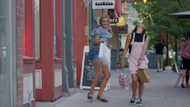 Carefree Girls Carrying Shopping Bags Dancing City Sidewalk Provo Utah — Stock Video