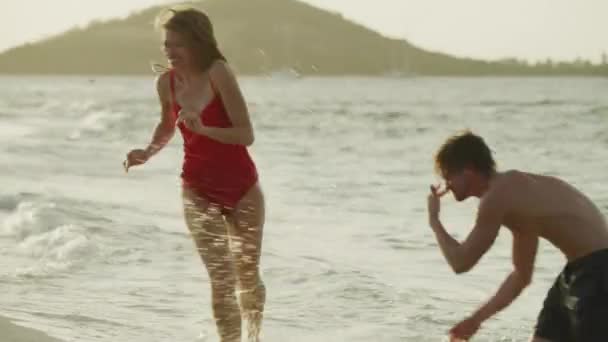 Playful Couple Splashing Each Other Ocean Kissing Beach Petit Tabac — Video Stock