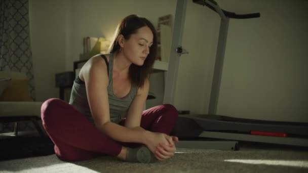 Woman Sitting Floor Night Holding Feet Stretching Legs Murray Utah — Stock Video