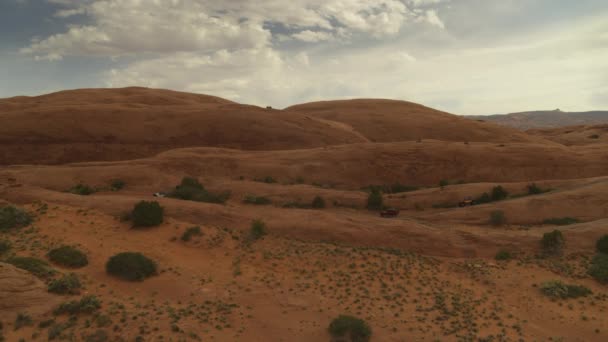 Aerial View Distant Cars Driving Trail Sand Flats Clouds Moab — Stock Video