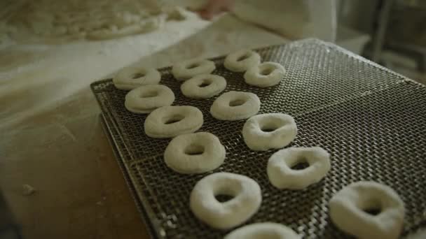 Close Baker Placing Donut Tough Baking Rack Pleasant Grove Utah — стоковое видео