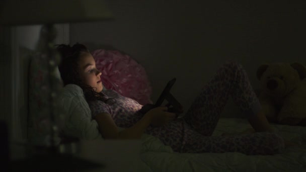 Medium Shot Window Girl Reading Digital Tablet Bed Night Provo — Video Stock