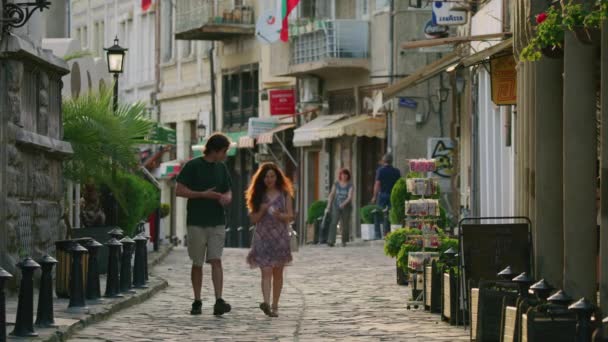 Wide Slow Motion Shot Couple Walking Cobblestone Street Veliko Tarnovo — Stock Video