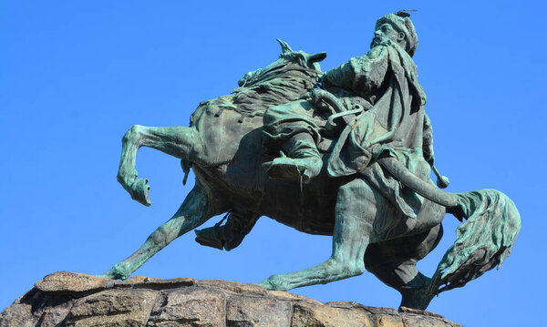 KYIV UKRAINE - 09 04 17: Bohdan Khmelnytsky Monument dedicated to the Hetman of Zaporizhian Host Bohdan Khmelnytsky. It is one of the oldest sculptural monuments of Sophia Square a city's symbols.