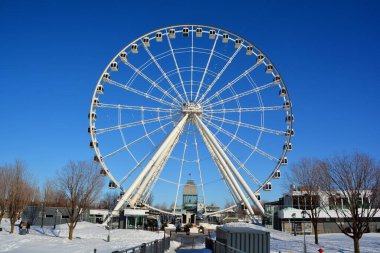 MONTREAL CANADA 02 15 22: La Grande Roue de Montreal the tallest Ferris wheel in Canada allows you to see the city and its surroundings from 60 metres in the air, the equivalent of 20-storey building