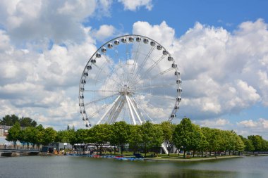 MONTREAL CANADA 07 30 20: La Grande Roue de Montreal the tallest Ferris wheel in Canada allows you to see the city and its surroundings from 60 metres in the air, the equivalent of 20-storey building