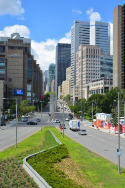 MONTREAL QUEBEC CANADA 07 30 2020: Buildings in Montreal's International District. The main purpose of the project was to restore the continuity of Montreal's downtown.