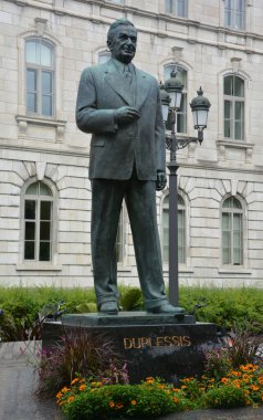 QUEBEC CITY QUEBEC CANADA 08 20 2020: Statue tribute to the nationalism of Maurice Duplessis who was 16th Premier Premier of Quebec from 1936 to 1939 and from 1944 to 1959.