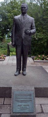 QUEBEC CITY QUEBEC CANADA 08 20 2020: Statue of Jean Lesage former prime minister in front the National Assembly of Quebec is the legislative body of the province of Quebec 