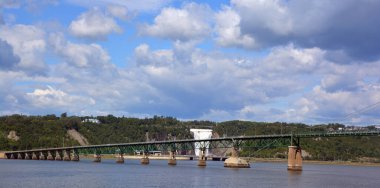 QUEBEC CANADA 08 24 2020: Ile d'orlean bridge and Montmorency Falls is a large waterfall on the Montmorency The falls are located on the boundary between the borough of Beauport, and Boischatel