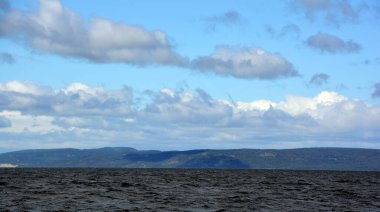 a view of the sea with a beautiful sky 