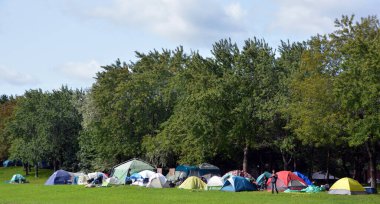 MONTREAL QUEBEC, CANADA - 09.12.2020: Residents of Montreal homeless shelters. A group of about 50 people who have been living in tents along Montreal's Notre-Dame Street are refusing to leave