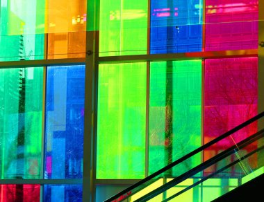 MONTREAL QUEBEC CANADA 12 13 2021: Colorful windows of the Palais des congres de Montreal is a convention centre in Montreal's Quartier international at the north end of Old Montreal.