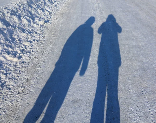 Men shadow during winter time in Quebec, Canada