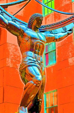 NEW YORK, USA 10 25 2013: The historic Atlas Statue in the Rockefeller Center stands for power in the Fifth Ave where is located the most expensive retail stores of New York city