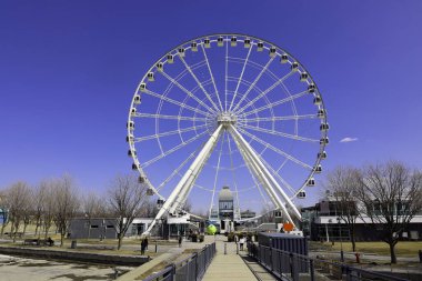 MONTREAL CANADA 04 06 22: La Grande Roue de Montreal the tallest Ferris wheel in Canada allows you to see the city and its surroundings from 60 metres in the air, the equivalent of 20-storey building