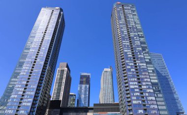 bottom view shot of skyscrapers on street of Montreal, Canada