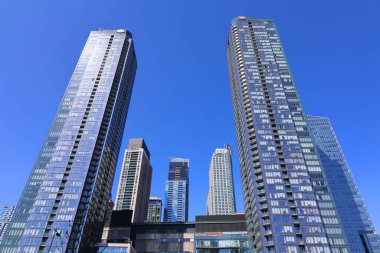 bottom view shot of skyscrapers on street of Montreal, Canada