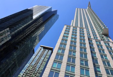 bottom view shot of skyscrapers on street of Montreal, Canada