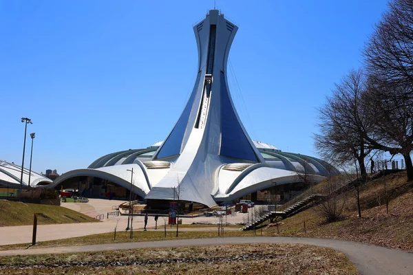 MONTREAL CANADA 07 12 2019: Montreal Olympic tower and olympic rings. Olympic flame is a symbol of the Olympic Games Commemorating the theft of fire from the Greek god Zeus by Prometheus