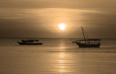 NUNGWI BEACH ZANZIBAR TANZANIA 23 11 2011: Fisherman Boat at sunset, Taken at Nungwi Village, Zanzibar Island, Tanzania Nungwi. Nungwi is traditionally the centre of Zanzibar's dhow-building industry.
