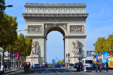 PARIS, FRANCE 10 19 14: Triumphal Arch de l'Etoile. The monument was designed by Jean Chalgrin in 1806 and Avenue des Champs-Elysees one of the most recognisable avenues in the world