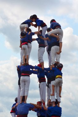 MONTREAL QUEBEC CANADA 08 19 2015: A castell is a human tower built traditionally at festivals in Catalonia, the Balearic islands and the Valencian Community