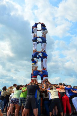 MONTREAL QUEBEC CANADA 08 19 2015: A castell is a human tower built traditionally at festivals in Catalonia, the Balearic islands and the Valencian Community