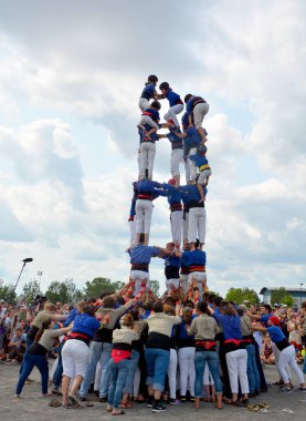 MONTREAL QUEBEC CANADA 08 19 2015: A castell is a human tower built traditionally at festivals in Catalonia, the Balearic islands and the Valencian Community