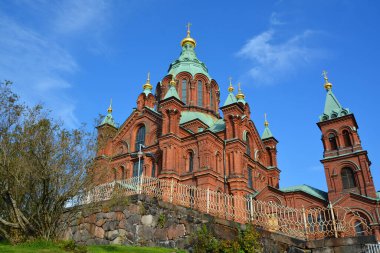 HELSINKI FINLAND - SEPTEMBER 26 2105: Uspenski Cathedral is an Eastern Orthodox cathedral in Helsinki, Finland, dedicated to the Dormition of the Theotokos (the Virgin Mary).