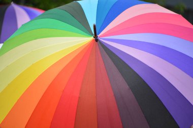 Design made with an umbrella sign illustration pop-art background icon with color spots