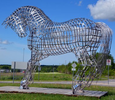 BROMONT QUEBEC CANADA MAY 28 2016: By Mathieu Isabelle new statue in Bromont. The home of the Parc equestre Olympique de Bromont, equestrian olympic park.