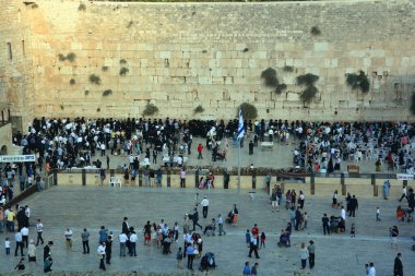 JERUSALEM ISRAEL 26 10 16: Jewish hasidic men pray a the Western Wall, Wailing Wall the Place of Weeping is an ancient limestone wall in the Old City of Jerusalem. Second Jewish Temple by Herod the Great