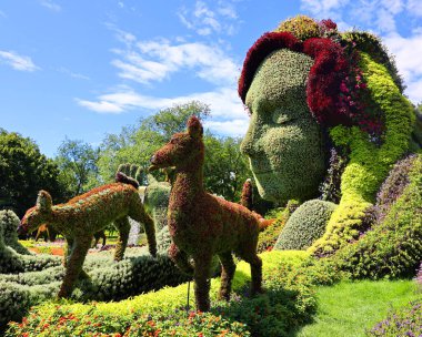 Mosaiculture 'daki kız heykeli Bir Zamanlar Dünyası' nda sergi, gezegenimizdeki yaşamın güzelliği için bir ilahi olacak.